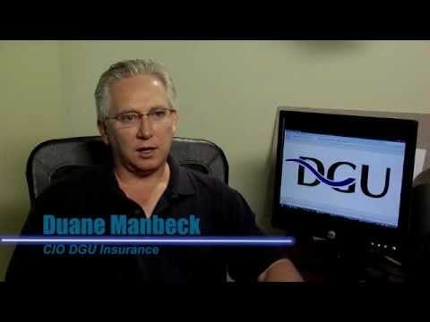 Video Image: Man sitting at desk, DGU Insurance logo displayed on computer